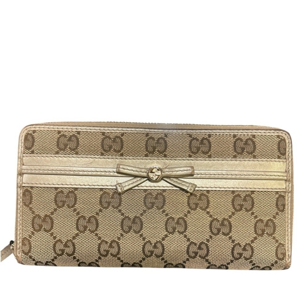 Gucci Beige and Brown Monogram Wallet with gold bow accent 💖